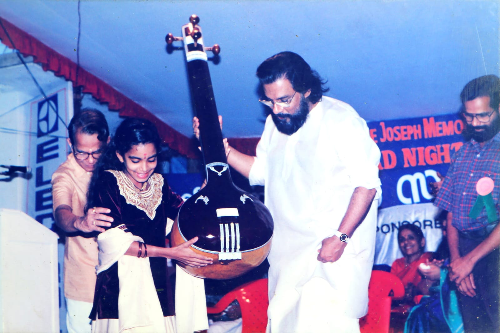 Receiving Augustine Joseph Memorial Thamburu Puraskara